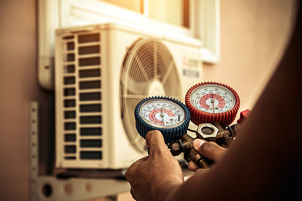 Professional Hvac technician working in Vanleer, TN